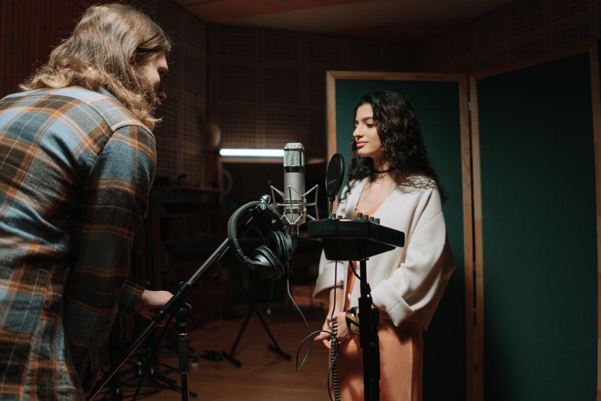 Artists collaborating in a recording studio